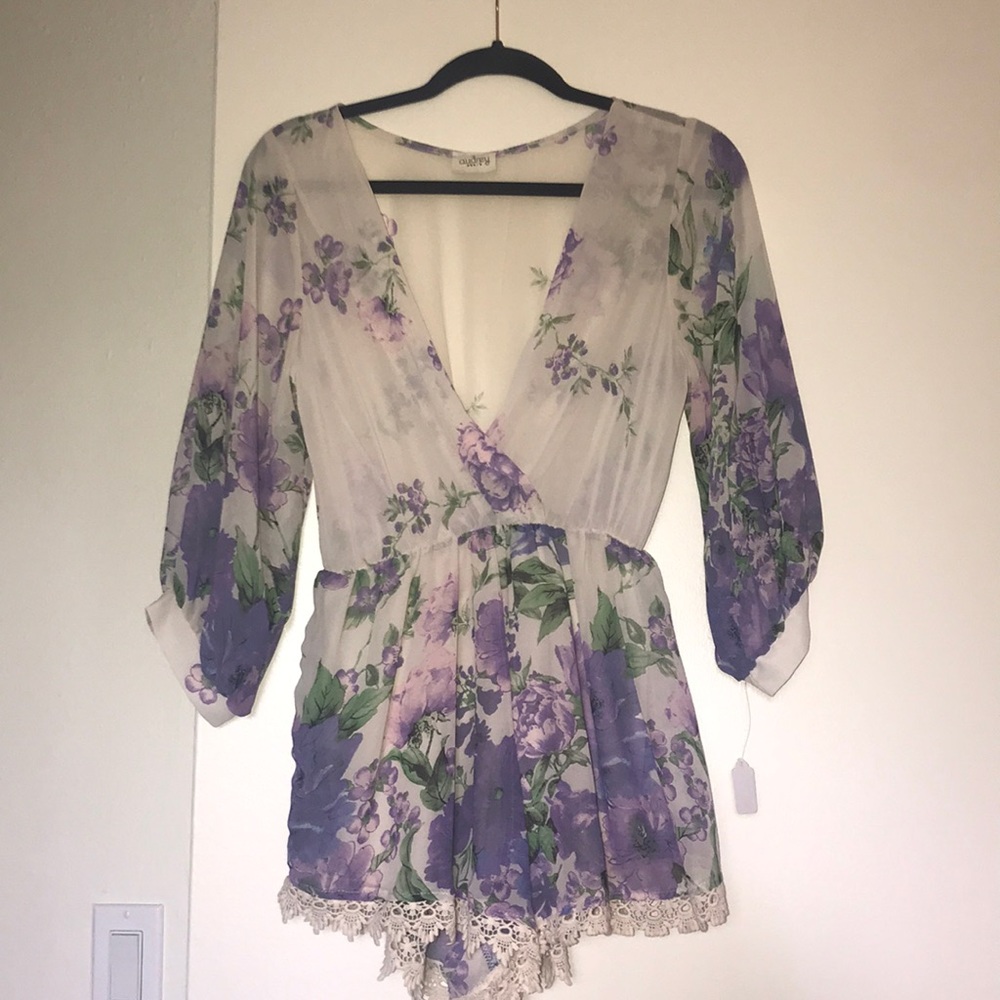 FLORAL PRINT ROMPER (NEVER WORN)